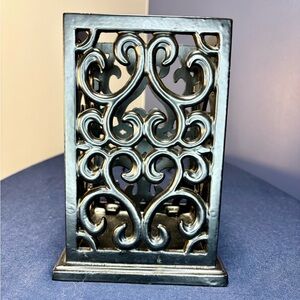 Black vintage cast iron utensil holder